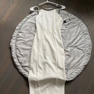 White fitted mid dress. Sexy back with rhinestone neckline and trim